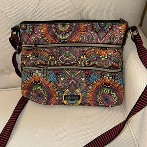 Sakroots Red and Blue Crossbody Bag with Bohemian Flair